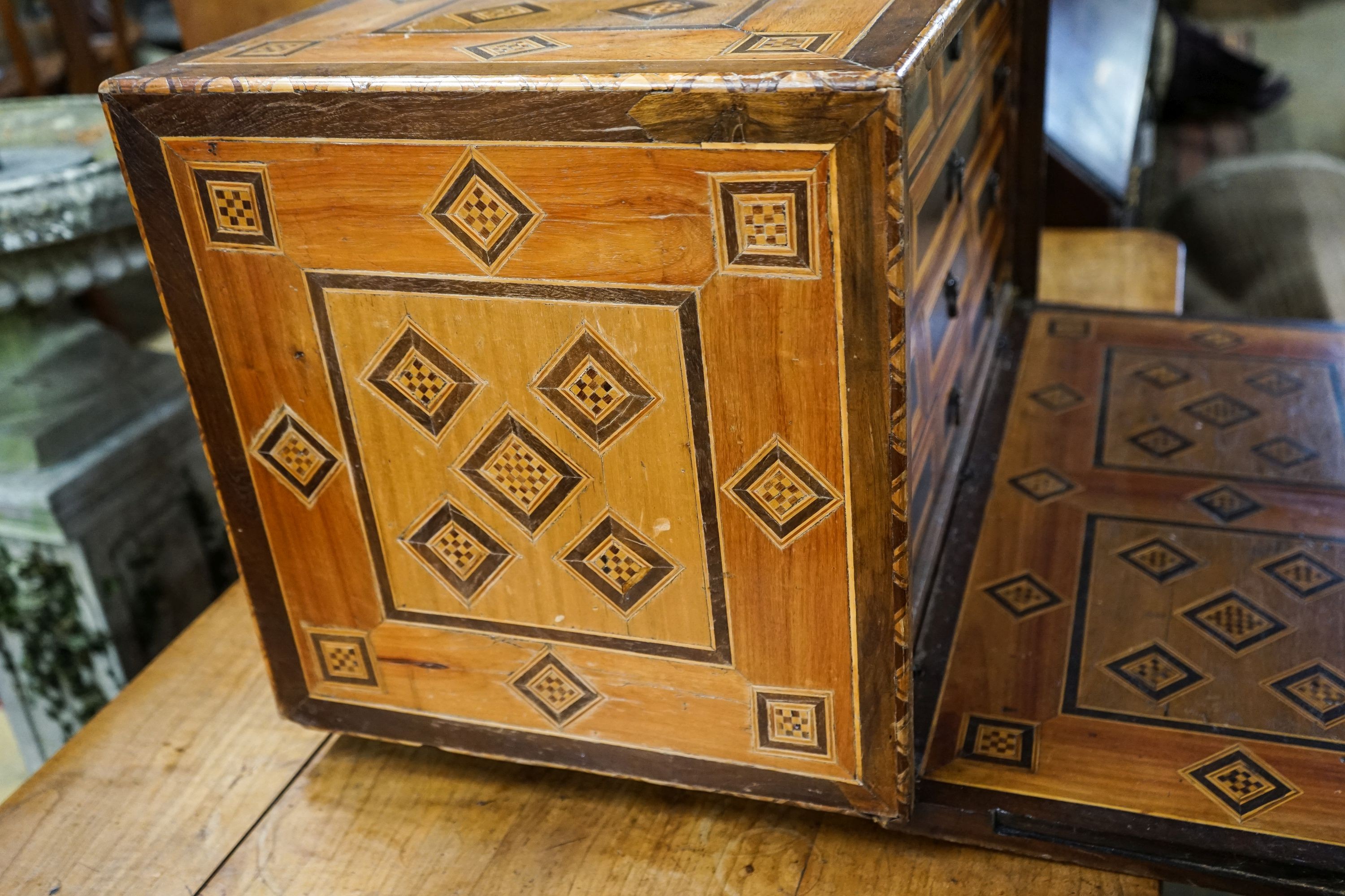 A 19th century Damascan parquetry inlaid fall front chest with two drawer interior, width 75cm, depth 40cm, height 43cm